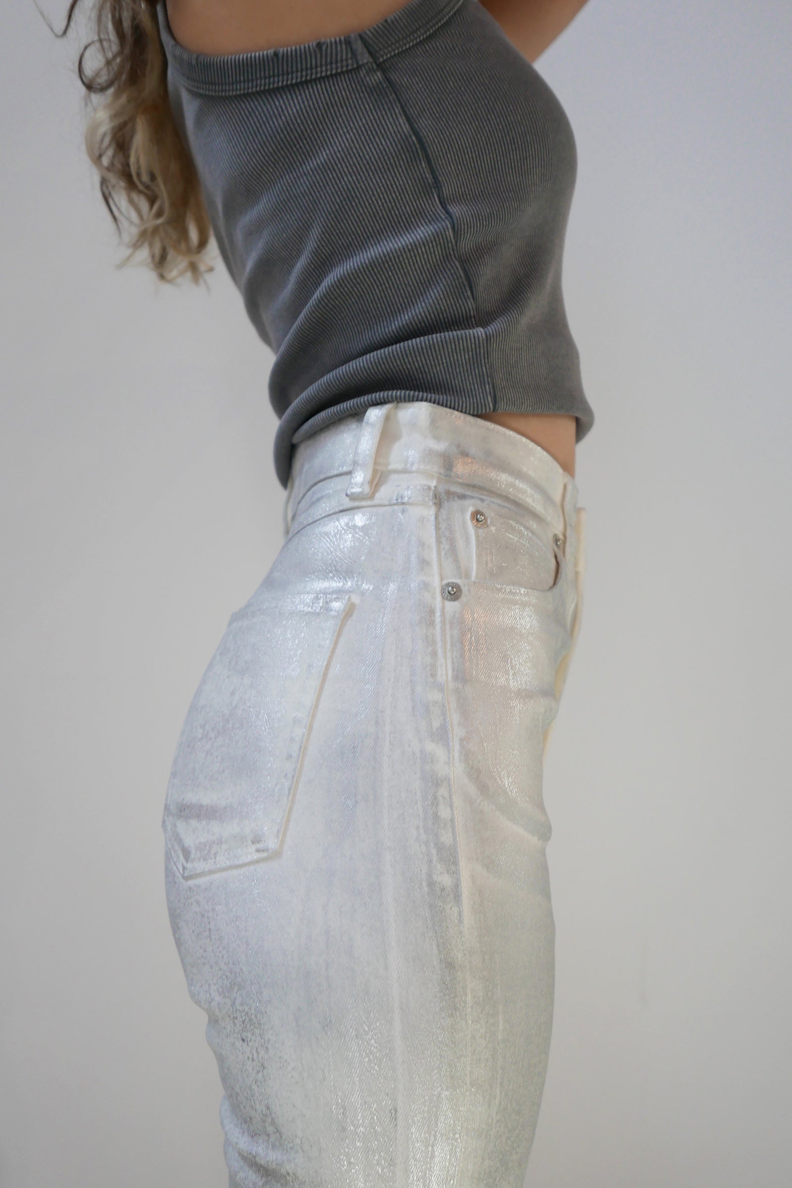Coated High Rise Skinny - Metallic Icy Grey Model side close up